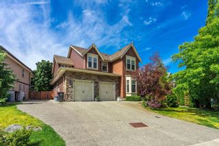 Photo 1: 35552 ANGUS Crescent in Abbotsford: Abbotsford East House for sale in "SandyHill" : MLS®# R2899946