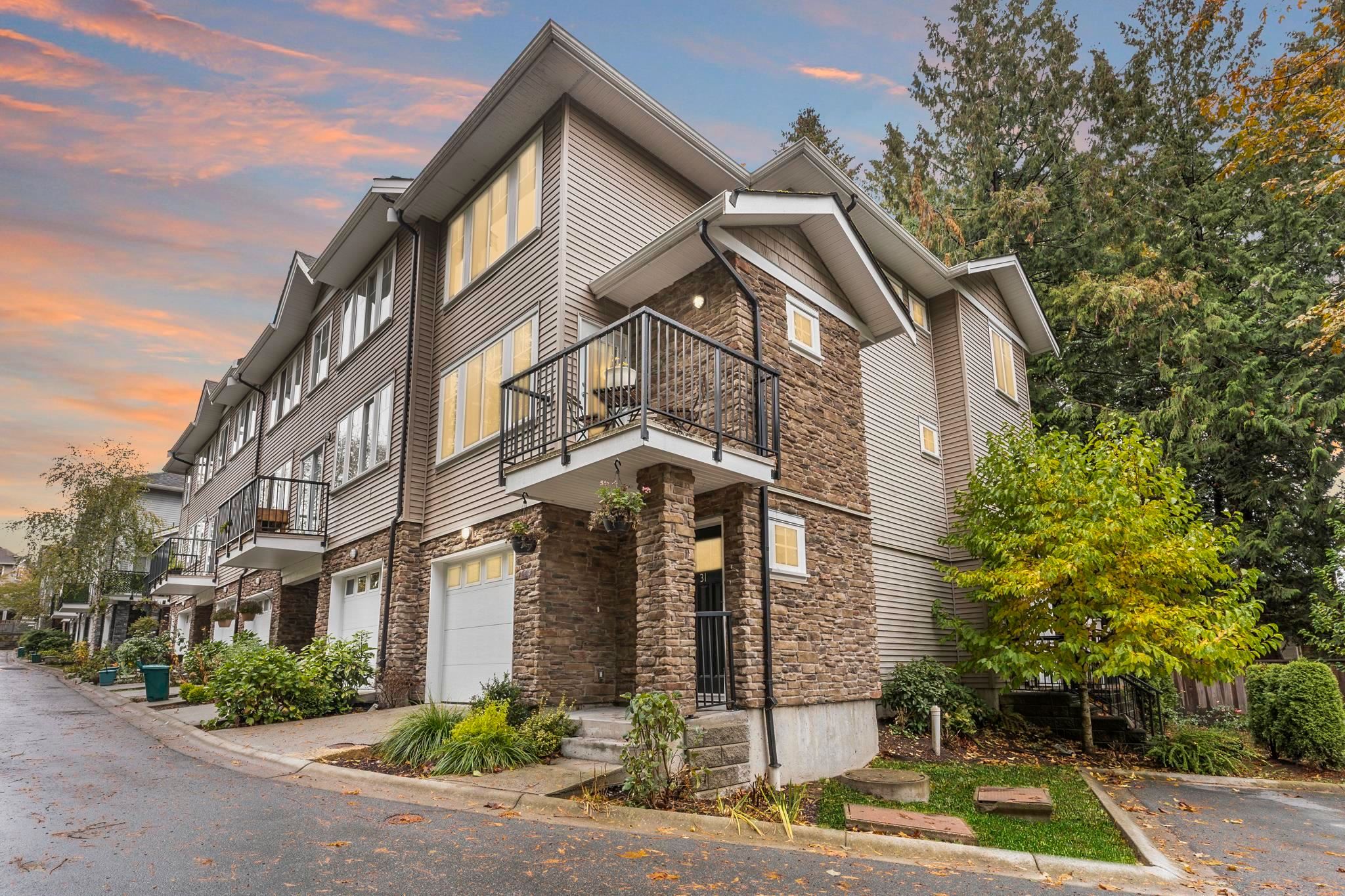 Main Photo: 31 13864 HYLAND Road in Surrey: East Newton Townhouse for sale in "TEO" : MLS®# R2735802
