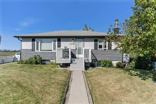 Photo 1: 6504 32 Avenue NW in Calgary: Bowness Detached for sale : MLS®# A2081476