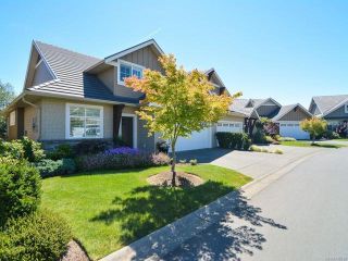 Photo 1: 105 1055 CROWN ISLE DRIVE in COURTENAY: CV Crown Isle Row/Townhouse for sale (Comox Valley)  : MLS®# 740518