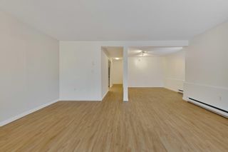 Photo 4: 110 2410 CORNWALL Avenue in Vancouver: Kitsilano Condo for sale in "SPINNAKER" (Vancouver West)  : MLS®# R2865481