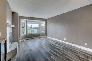 Photo 11: 9 Sandarac Way NW in Calgary: Sandstone Valley Row/Townhouse for sale : MLS®# A2050563