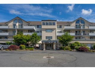 Photo 1: 304 19645 64 Avenue in Langley: Willoughby Heights Condo for sale in "Highgate Terrace" : MLS®# R2708162