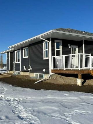 Photo 4: 6301 58A Street: Rocky Mountain House Semi Detached (Half Duplex) for sale : MLS®# A2109083