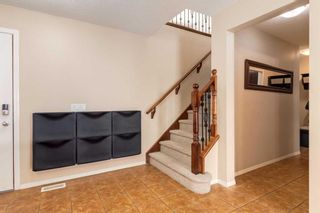 Photo 16: 200 Cougartown Close SW in Calgary: Cougar Ridge Detached for sale : MLS®# A2124049