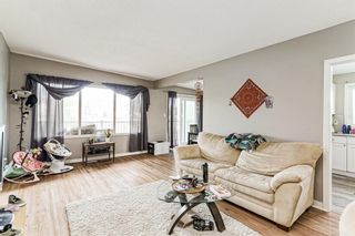 Photo 2: 513 78 Avenue NW in Calgary: Huntington Hills Semi Detached (Half Duplex) for sale : MLS®# A2007199