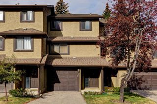 Photo 2: 69 Glamis Gardens SW in Calgary: Glamorgan Row/Townhouse for sale : MLS®# A2006286