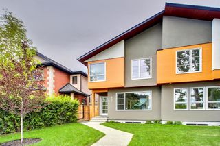 Main Photo: 832 22 Avenue NW in Calgary: Mount Pleasant Semi Detached (Half Duplex) for sale : MLS®# A2044089