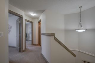 Photo 14: 912 89 Street SW in Calgary: West Springs Semi Detached for sale