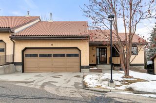 Photo 1: 16 118 Strathcona Road SW in Calgary: Strathcona Park Semi Detached for sale : MLS®# A1187934