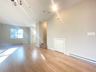 Photo 3: 202 4135 SARDIS Street in Burnaby: Central Park BS Townhouse for sale in "Paddington House" (Burnaby South)  : MLS®# R2833535