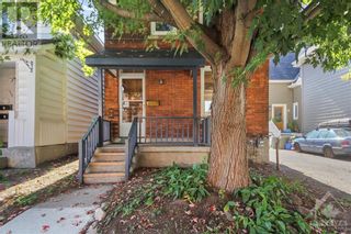 Photo 1: 712 COOPER STREET in Ottawa: House for sale : MLS®# 1361115