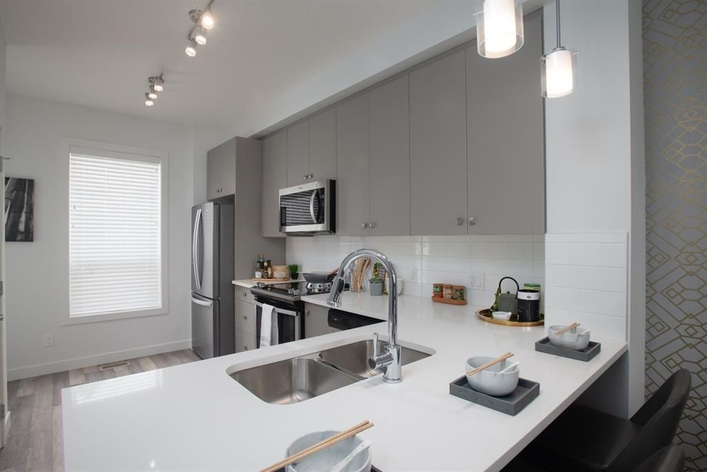 Main Photo: 706 15 Evanscrest Park NW in Calgary: Evanston Row/Townhouse for sale : MLS®# A1011184