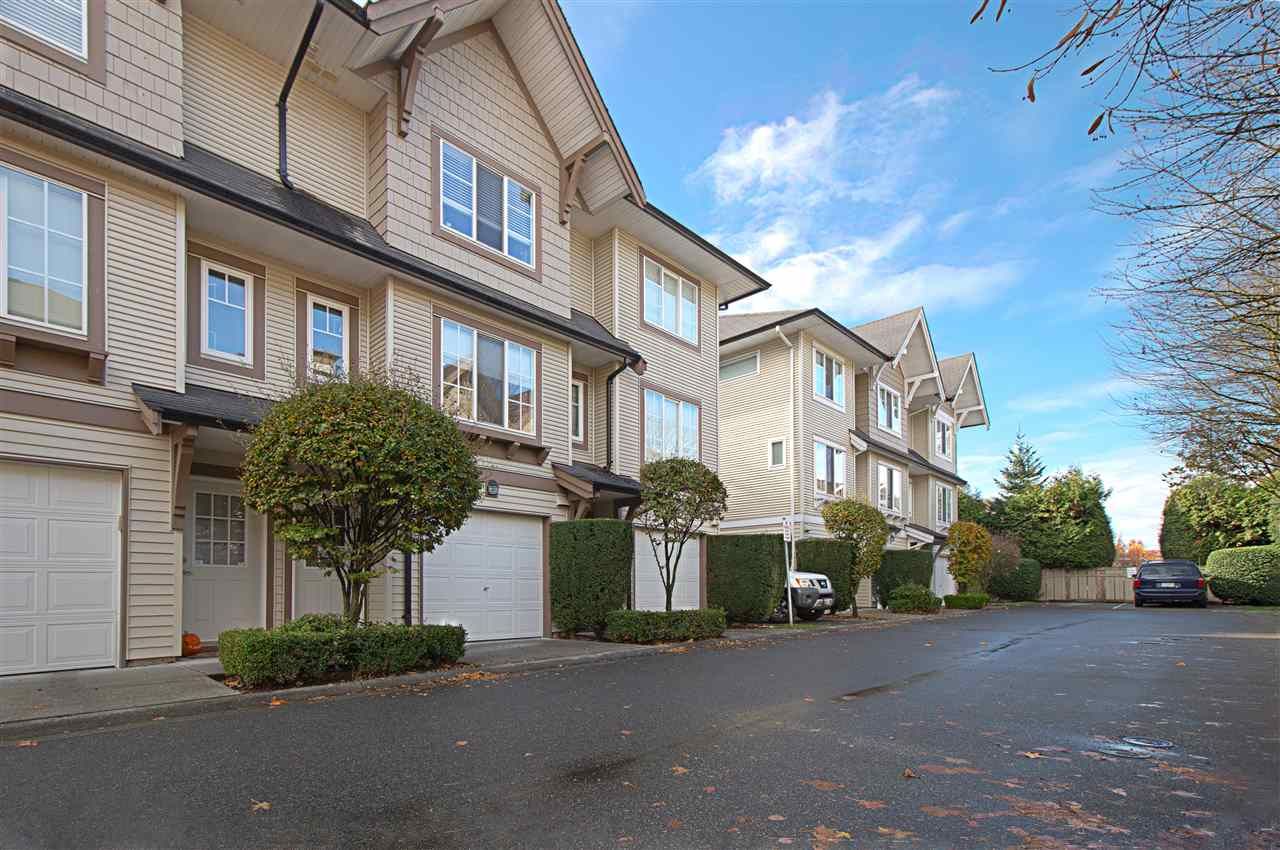 Main Photo: 21 20540 66 Avenue in Langley: Willoughby Heights Townhouse for sale in "Amberleigh" : MLS®# R2318754