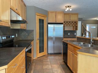 Photo 11: 54 Springborough Point SW in Calgary: Springbank Hill Detached for sale : MLS®# A1227826