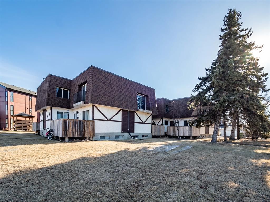 Main Photo: 305 Waddy Lane: Strathmore Row/Townhouse for sale : MLS®# A2048340