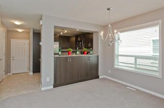 Photo 10: 3071 WINDSONG Boulevard SW: Airdrie Row/Townhouse for sale : MLS®# C4300138