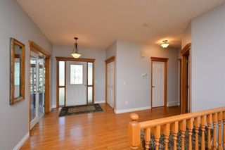 Photo 3: 303 GLENEAGLES View: Cochrane House for sale : MLS®# C4130061
