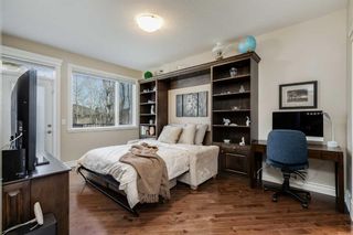 Photo 11: 16 Coulee Park SW in Calgary: Cougar Ridge Detached for sale : MLS®# A2125322