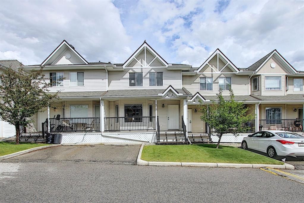 Main Photo: 213 950 ARBOUR LAKE Road NW in Calgary: Arbour Lake Row/Townhouse for sale : MLS®# A1015035
