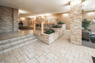 Photo 3: 428 345 Rocky Vista Park NW in Calgary: Rocky Ridge Apartment for sale : MLS®# A2143838