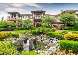 Photo 1: 106 16469 64 Avenue in Surrey: Cloverdale BC Condo for sale in "ST. ANDREWS" (Cloverdale)  : MLS®# R2428596