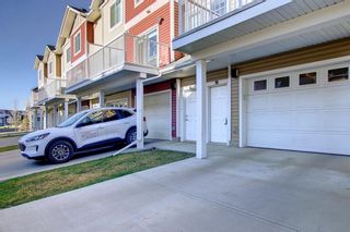 Photo 3: 16 Redstone Circle NE in Calgary: Redstone Row/Townhouse for sale : MLS®# A1215153
