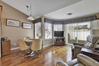 Photo 11: 107 19649 53 Avenue in Langley: Langley City Townhouse for sale in "HUNTSFIELD GREEN" : MLS®# R2672468