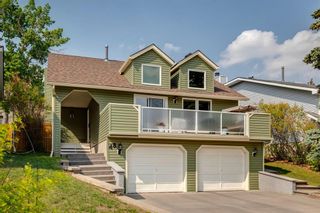 Photo 2: 48 Strathclair Place SW in Calgary: Strathcona Park Detached for sale : MLS®# A2052523