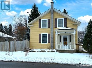 Photo 1: 206 DRUMMOND STREET E in Merrickville: House for sale : MLS®# 1375095