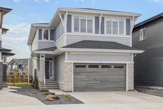 Photo 1: 12 Creekstone Cove SW in Calgary: C-168 Detached for sale : MLS®# A2129612