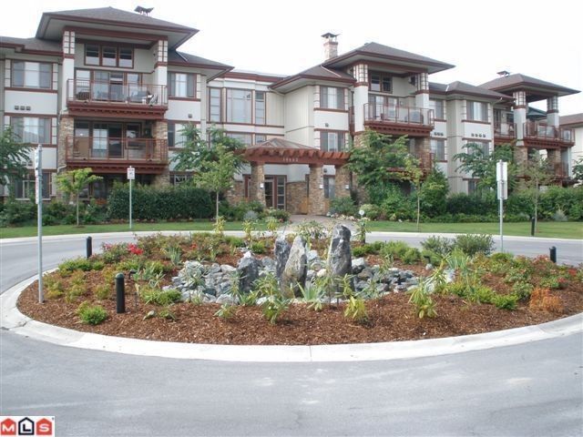 Main Photo: 104 16483 64TH Avenue in Surrey: Cloverdale BC Condo for sale in "SAINT ANDREWS" (Cloverdale)  : MLS®# F1020760