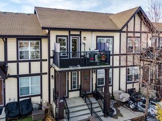 Photo 1: 216 CRANFORD Court SE in Calgary: Cranston Row/Townhouse for sale : MLS®# A2035091