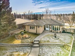 Photo 1: 411 Wilkinson Place SE in Calgary: Willow Park Detached for sale : MLS®# A2096753