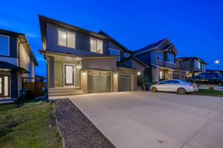 Photo 2: 129 Carringvue Park NW in Calgary: Carrington Semi Detached (Half Duplex) for sale : MLS®# A2129330