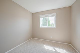 Photo 27: 165 Everstone Drive SW in Calgary: Evergreen Semi Detached (Half Duplex) for sale : MLS®# A1233904