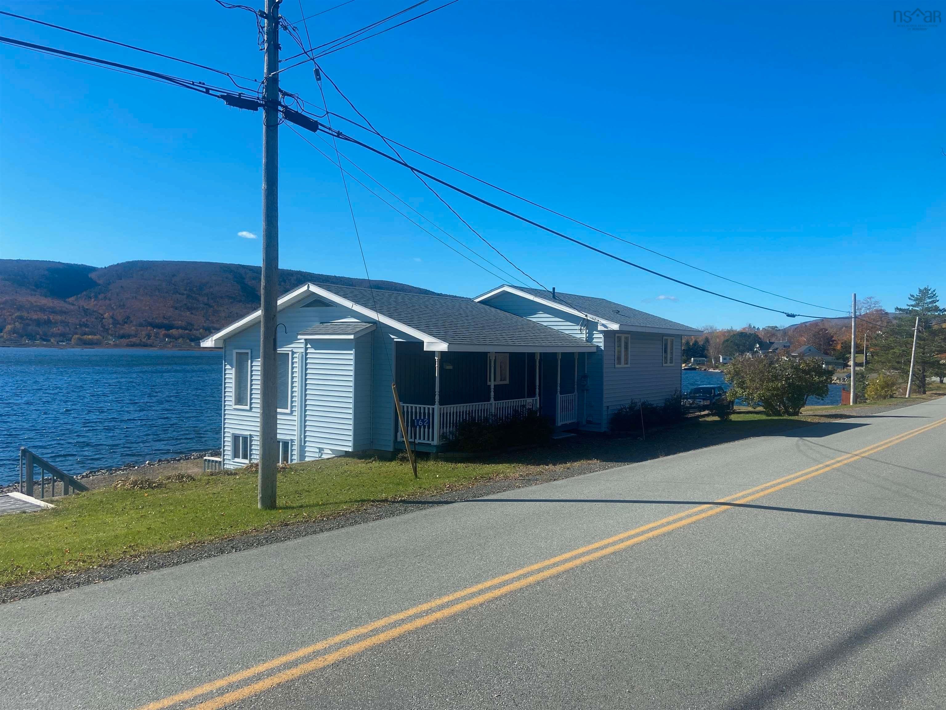 Main Photo: 162 Main Street in Whycocomagh: 306-Inverness County / Inverness Residential for sale (Highland Region)  : MLS®# 202323055