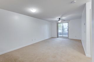 Photo 5: 1107 92 Crystal Shores Road: Okotoks Apartment for sale : MLS®# A2003628