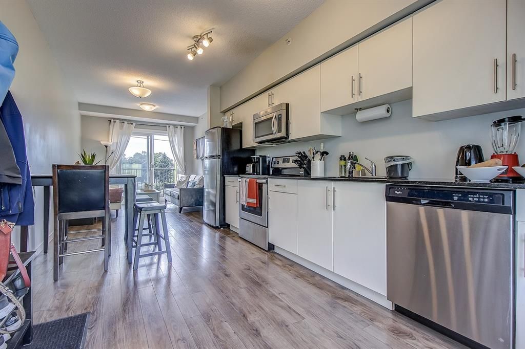 Photo 6: Photos: 407 1740 9 Street NW in Calgary: Mount Pleasant Apartment for sale : MLS®# A1141674