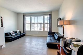 Photo 4: 581 Sherwood Boulevard NW in Calgary: Sherwood Row/Townhouse for sale : MLS®# A1233258