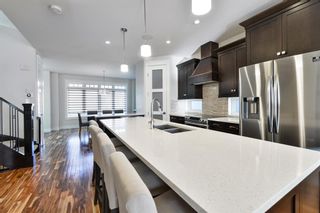 Photo 8: 517 14 Avenue NE in Calgary: Renfrew Semi Detached (Half Duplex) for sale : MLS®# A2032562