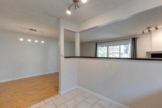 Photo 8: 313 28 Avenue NE in Calgary: Tuxedo Park Semi Detached (Half Duplex) for sale : MLS®# A2079035