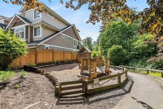 Photo 31: 42 21704 96 Avenue in Langley: Walnut Grove Townhouse for sale in "Redwood Bridge Estates" : MLS®# R2877987