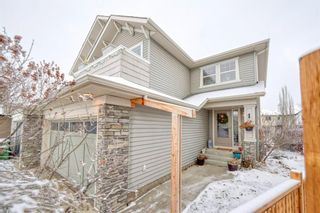 Photo 1: 133 Cougarstone Place SW in Calgary: Cougar Ridge Semi Detached for sale : MLS®# A1050548