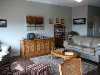 Photo 3: 153 Monteith Drive SE in : High River Residential Attached for sale : MLS®# C3564356