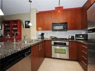Photo 2: 102 3551 FOSTER Avenue in Vancouver: Collingwood VE Condo for sale in "FINALE" (Vancouver East)  : MLS®# V901635