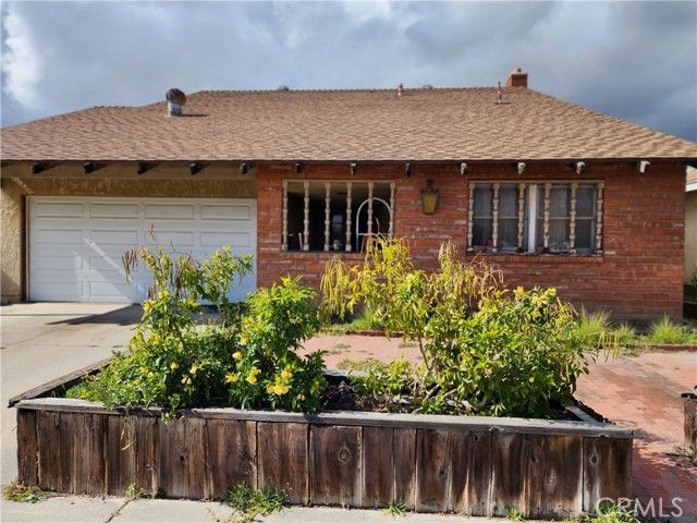 Main Photo: House for sale : 4 bedrooms : 1761 N Woodwind Lane in Anaheim