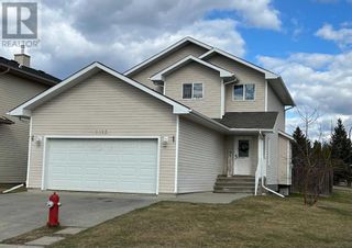 Photo 1: 1013 7th Street SW in Slave Lake: House for sale : MLS®# A2128582