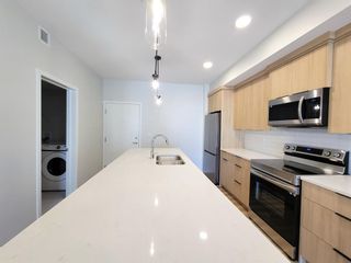 Photo 5: 1201 42 Cranbrook Gardens SE in Calgary: Cranston Apartment for sale : MLS®# A2047950