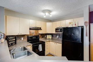 Photo 3: 6312 304 Mackenzie Way SW: Airdrie Apartment for sale : MLS®# A1169316